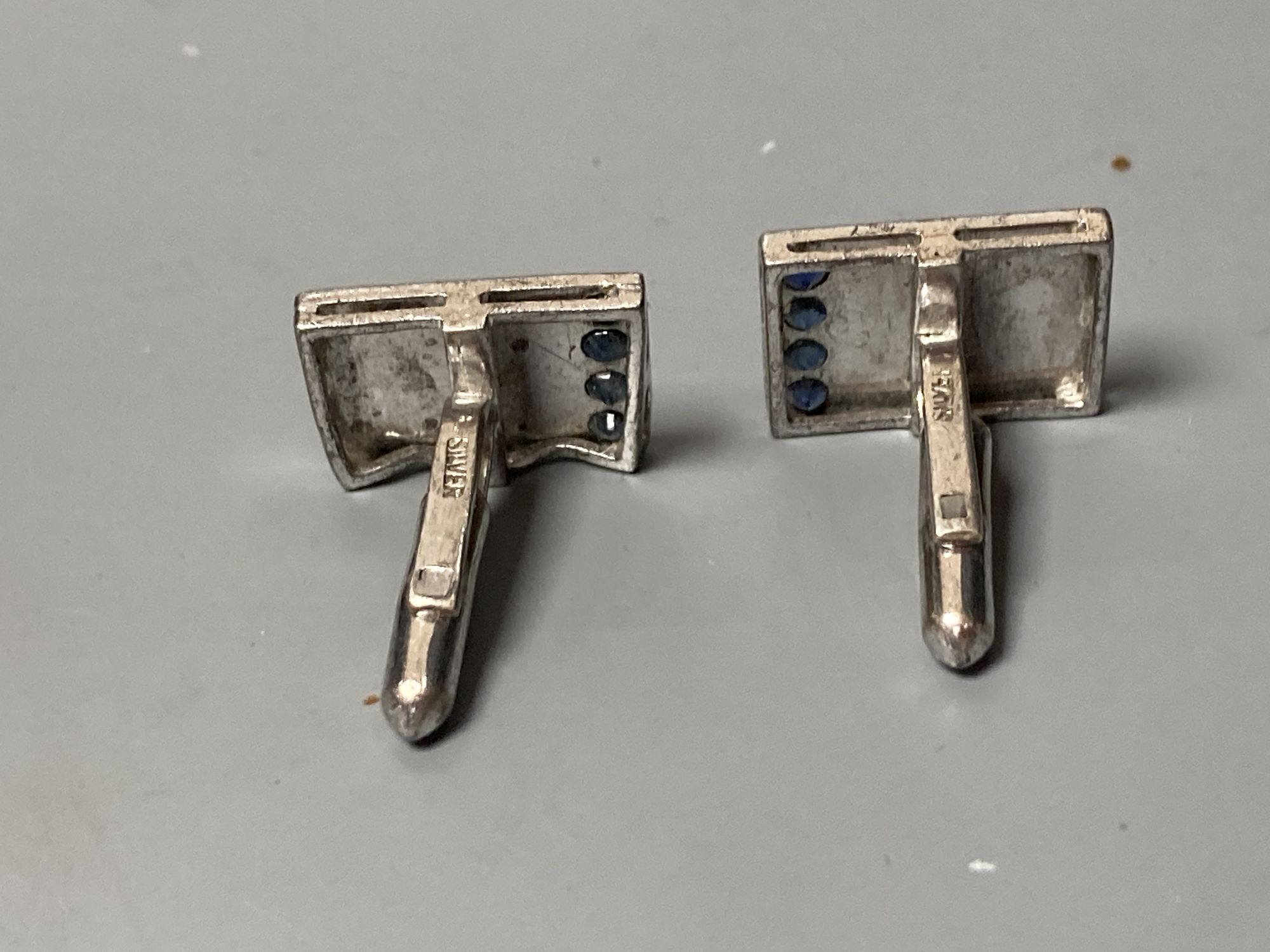Five assorted pairs of white metal cufflinks